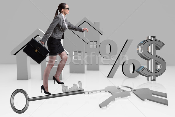 Businesswoman walking climbing stairs in mortgage Stock photo © Elnur