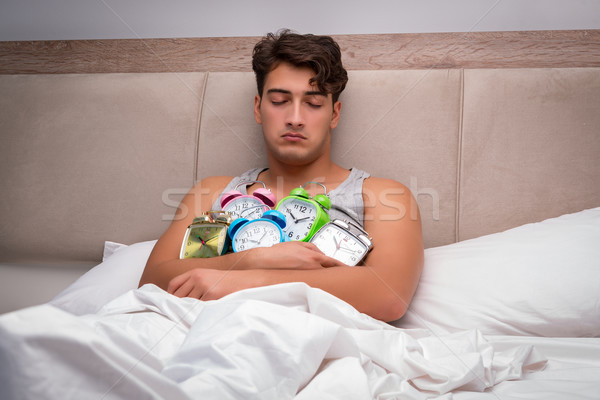 Man having trouble waking up in the morning Stock photo © Elnur