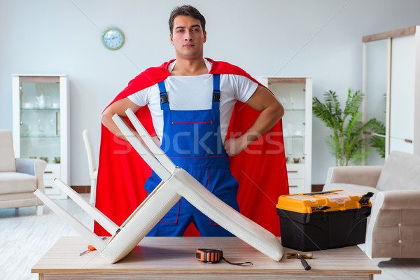 Szuperhős szerelő dolgozik otthon ház férfi Stock fotó © Elnur