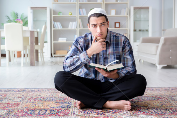 The muslim man praying at home Stock photo © Elnur