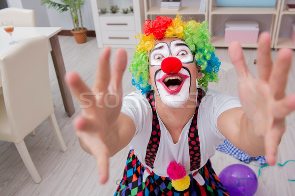 Drunk clown celebrating having a party at home Stock photo © Elnur