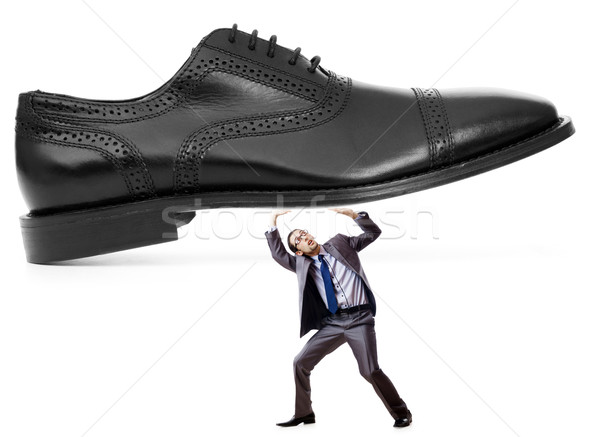 Woman domination concept with shoes and man Stock photo © Elnur