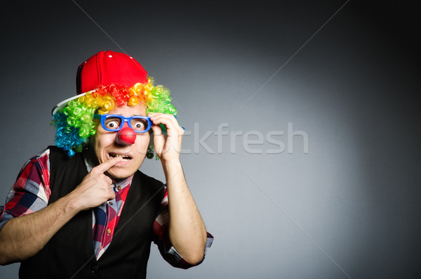 Funny clown against the dark background Stock photo © Elnur