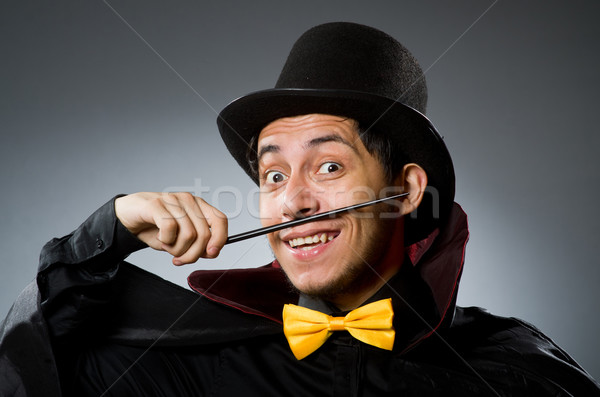 Funny magician man with wand and hat Stock photo © Elnur