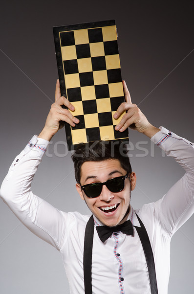 Funny chess player with board Stock photo © Elnur