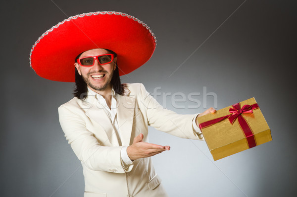 Person wearing sombrero hat in funny concept Stock photo © Elnur