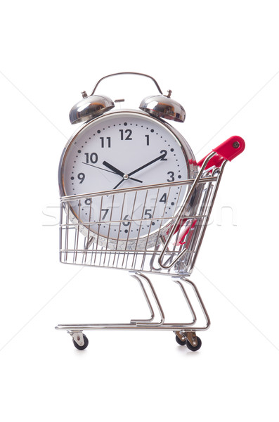 Big alarm clock in shopping cart on white Stock photo © Elnur