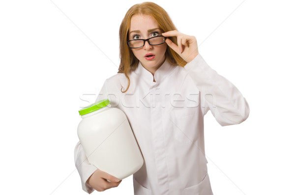 Young female doctor holding jar of protein isolated on white Stock photo © Elnur