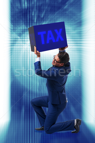 Man under the burden of tax payments Stock photo © Elnur