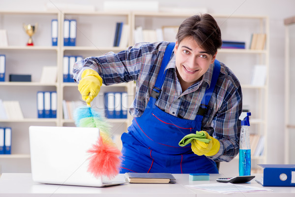 Male cleaner working in the office Stock photo © Elnur
