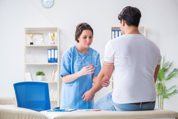 Man visiting female doctor in medical concept Stock photo © Elnur