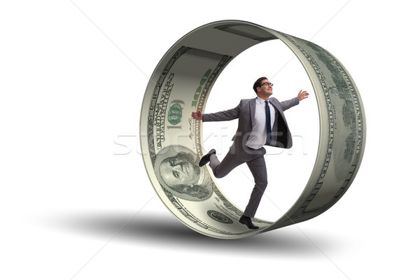 Businessman in hamster wheel chasing dollars Stock photo © Elnur
