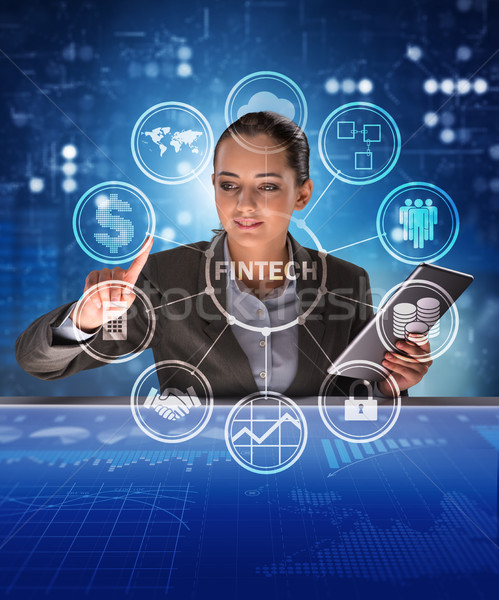 Businesswoman with tablet in financial technology fintech concep Stock photo © Elnur