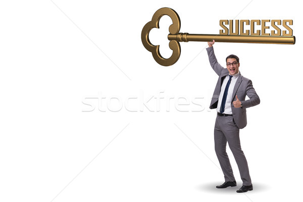 Businessman with key to success business concept Stock photo © Elnur
