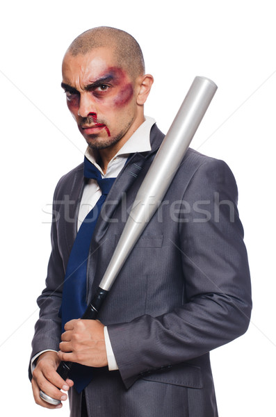 Badly bruised businessman with bat on white Stock photo © Elnur