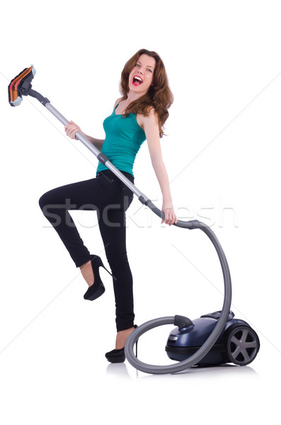 Young woman with vacuum cleaner on white Stock photo © Elnur