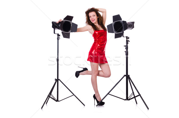 Woman in red dress posing in the studio Stock photo © Elnur