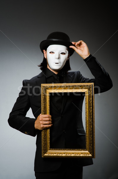 Funny concept with theatrical mask Stock photo © Elnur