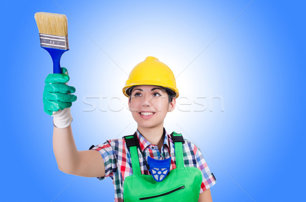 Stock photo: Woman painter with paintbrush on white