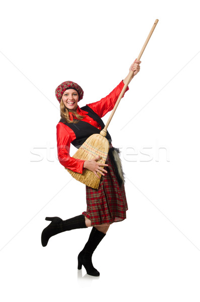 Funny woman in scottish clothing with broom Stock photo © Elnur