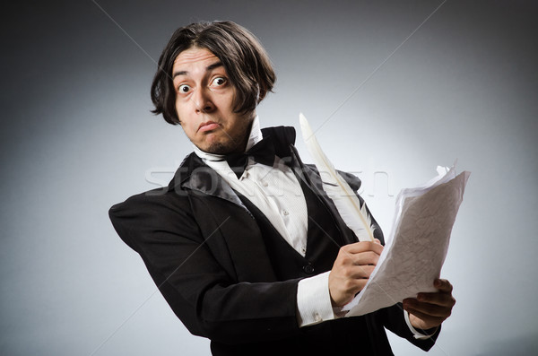 Funny writer with quill in vintage concept Stock photo © Elnur
