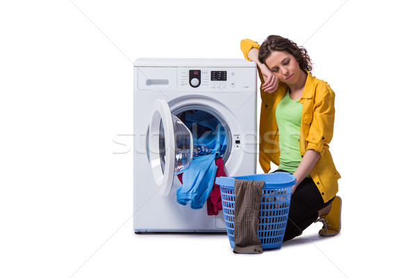 Woman tired after doing laundry isolated on white Stock photo © Elnur