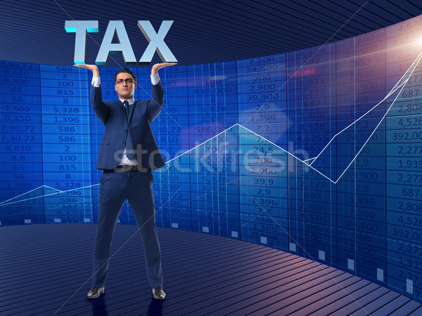 Man under the burden of tax payments Stock photo © Elnur