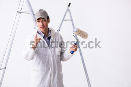 Stock photo: The man with axe isolated on the white