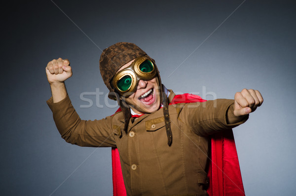 Funny pilot with goggles and helmet Stock photo © Elnur