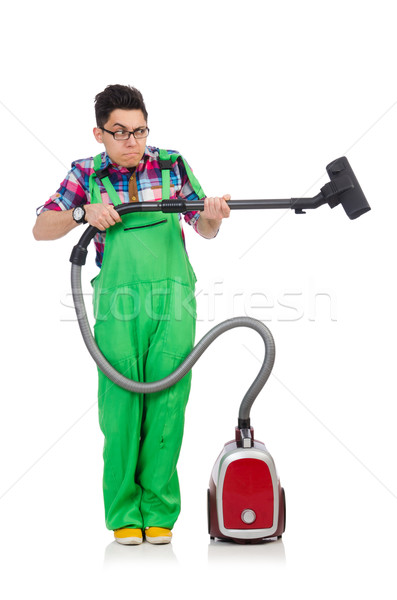 Funny man in green coveralls vacuum cleaning Stock photo © Elnur