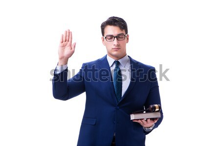 Young businessman holding a tool isolated on white Stock photo © Elnur