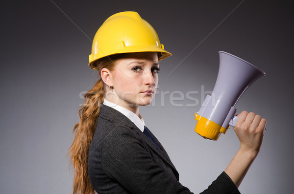 Stockfoto: Vrouwelijke · ingenieur · helm · luidspreker · geïsoleerd · grijs