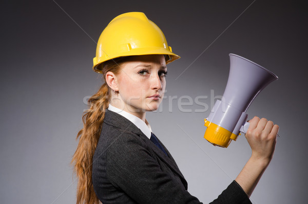 Femminile ingegnere casco altoparlante isolato grigio Foto d'archivio © Elnur