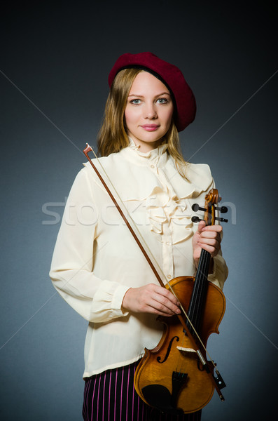Stock photo: Woman violin player in musical concept