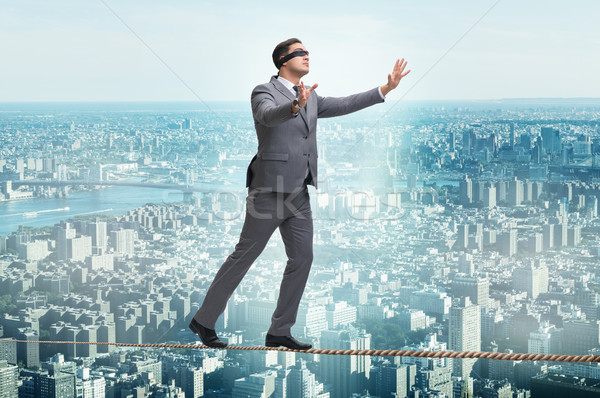 The man walking in tight rope blindfold Stock photo © Elnur