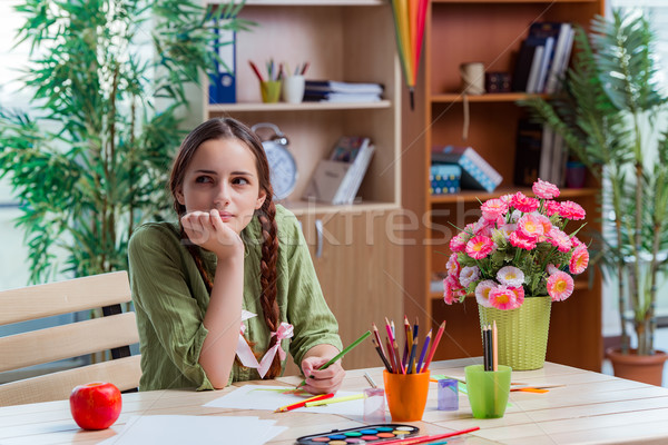 Young girl drawing pictures at home Stock photo © Elnur