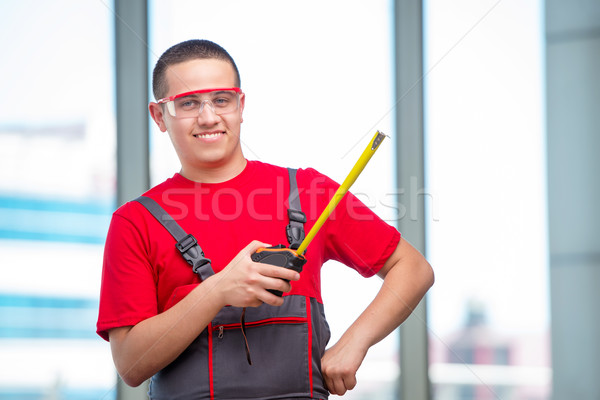 Young furniture carpenter in industrial concept Stock photo © Elnur