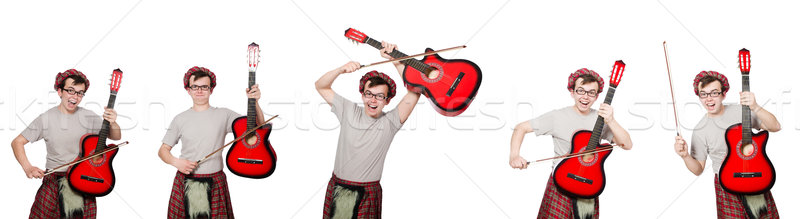 The funny scotsman with musical instrument isolated on white Stock photo © Elnur