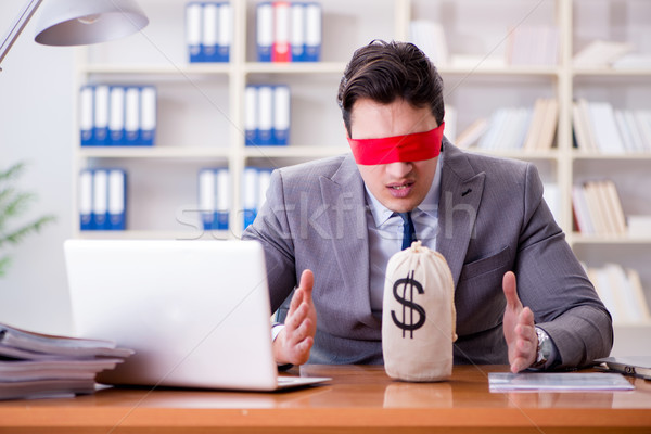 Blindfold businessman sitting at desk in office Stock photo © Elnur