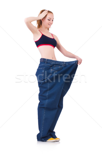 Frau groß Jeans Diäten Mädchen glücklich Stock foto © Elnur