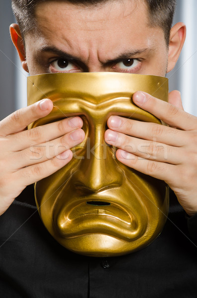 Funny concept with theatrical mask Stock photo © Elnur