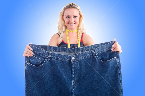 Femme régime grand jeans fille heureux [[stock_photo]] © Elnur