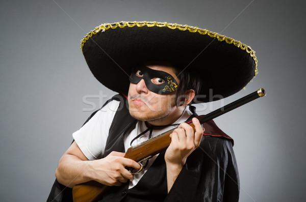 Person wearing sombrero hat in funny concept Stock photo © Elnur