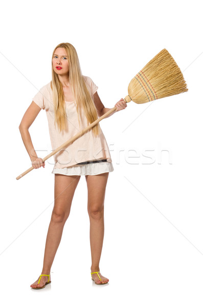 Young woman with broom isolated on white Stock photo © Elnur
