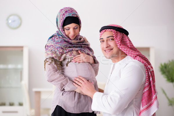The young arab muslim family with pregnant wife expecting baby Stock photo © Elnur