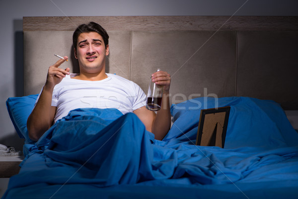 Umutsuz adam boşanmış yatak sevmek çift Stok fotoğraf © Elnur