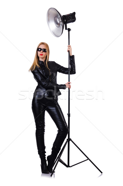 Woman in studio shoot-out Stock photo © Elnur