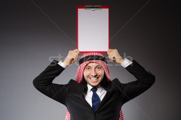Arab man with paper binder Stock photo © Elnur