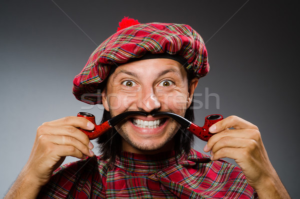 Funny scotsman with smoking pipe Stock photo © Elnur