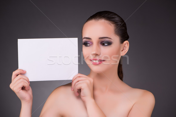 Beautiful woman with blank message paper Stock photo © Elnur